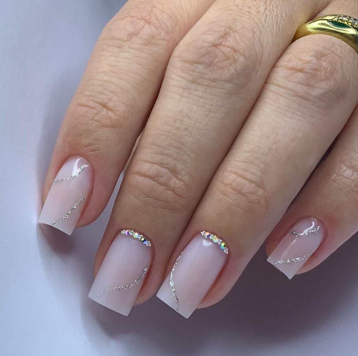 white nails with rhinestones